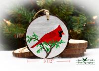 Measurements for a hand-painted northern cardinal wood slice ornament at covecreekphotography.com.