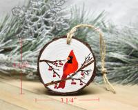 A diagram of measurements for a handmade northern cardinal wood slice Christmas ornament at Cove Creek Photography.