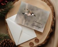 A handmade Christmas card with fine photography of a gadwall in flight with Season's Greetings at covecreekphotography.com.