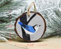 A handmade nuthatch Christmas ornament with a measurement diagram at covecreekphotography.com.