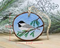 An image of a hand-painted chickadee wood slice ornament with a diagram of measurements at Cove Creek Photography.