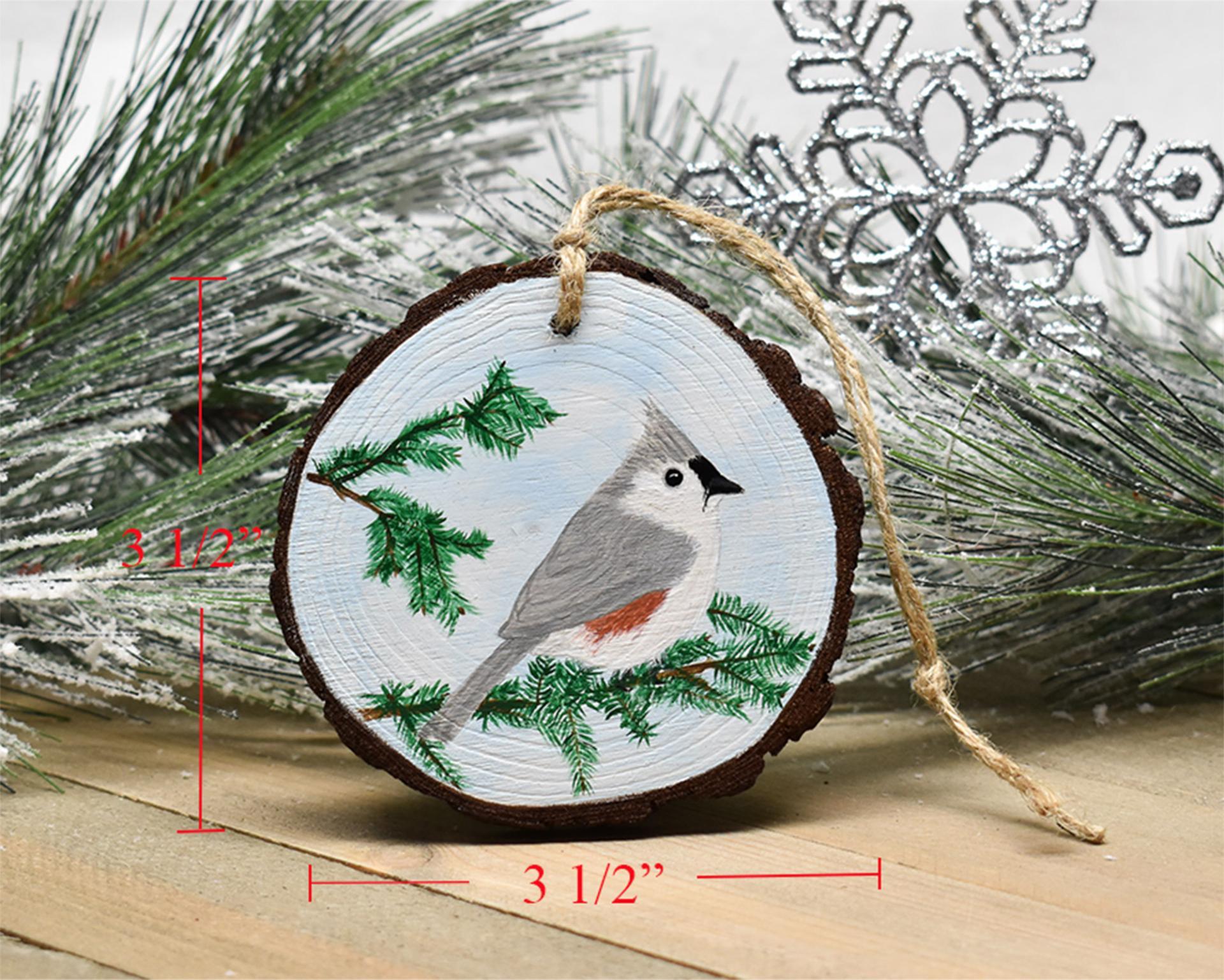 A hand-painted bird ornament with a diagram of measurements at covecreekphotography.com.